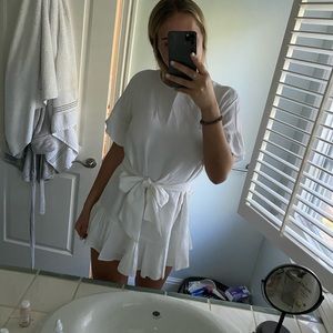 white dress with bow at waist